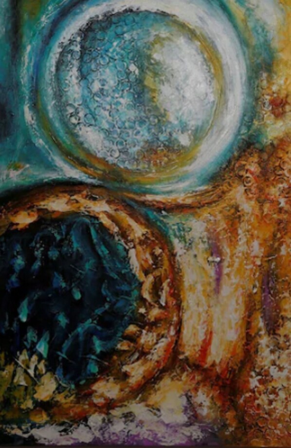 A close-up of a textured surface with circular patterns and abstract shapes.