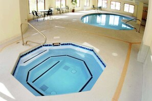 Indoor pool, open 9 AM to 10 PM, pool loungers