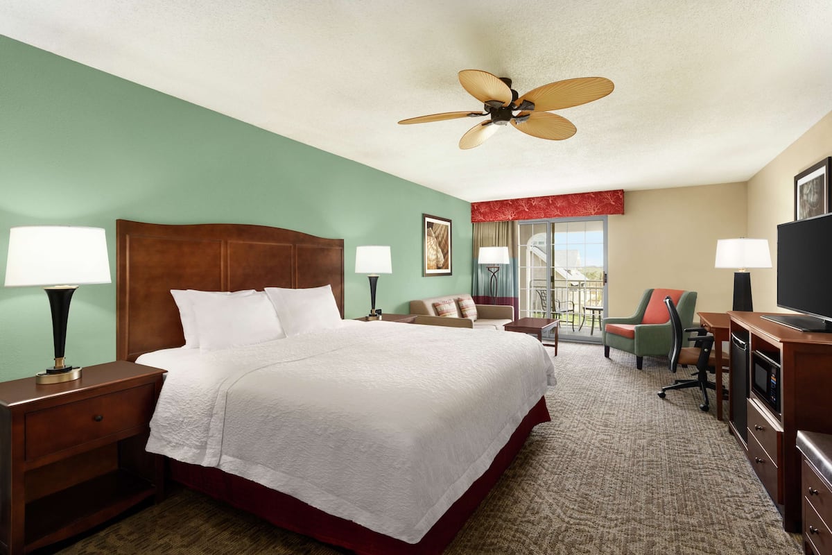 king room, partial ocean view, audio/visual | premium bedding, in-room safe, desk, blackout curtains