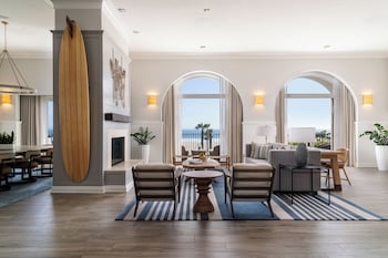 Suite (Presidential Beach House) | Living area | 65-inch flat-screen TV with cable channels, TV, iPod dock at Hyatt Regency Huntington Beach Resort and Spa