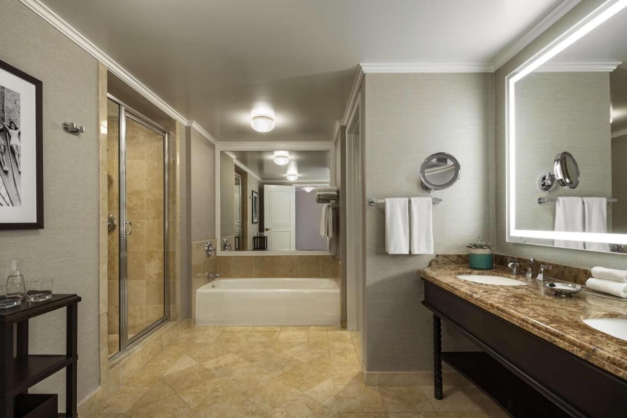 Bathroom | Combined shower/tub, designer toiletries, hair dryer, bathrobes