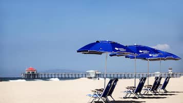 On the beach, sun loungers, beach umbrellas, beach towels