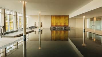 Indoor pool, open 8:00 AM to 8:30 PM, pool loungers