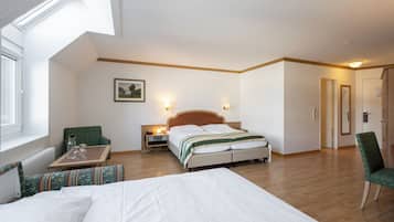 Literie hypoallergénique, minibar, coffres-forts dans les chambres