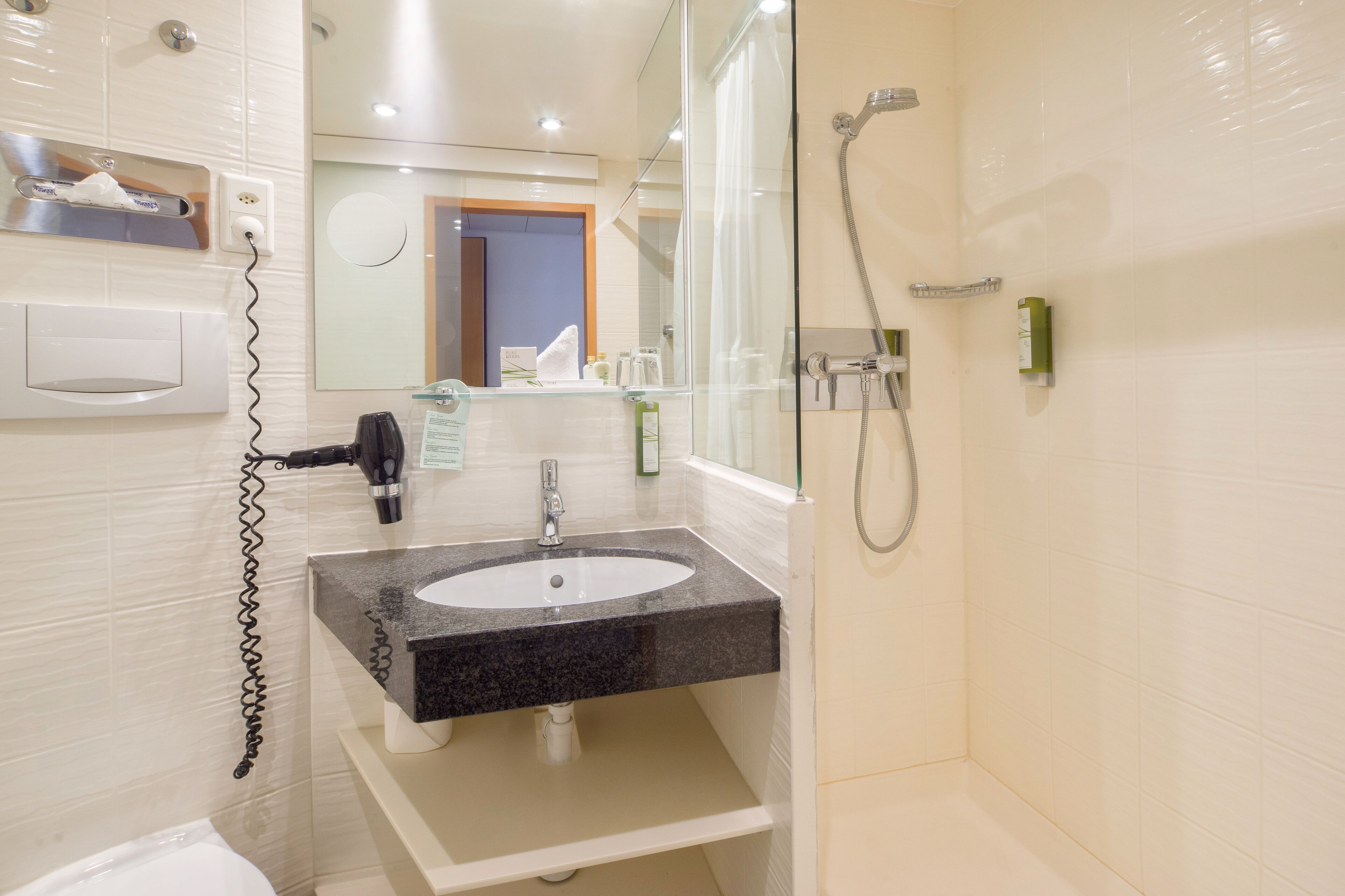 hydromassage showerhead, designer toiletries, hair dryer, bathrobes