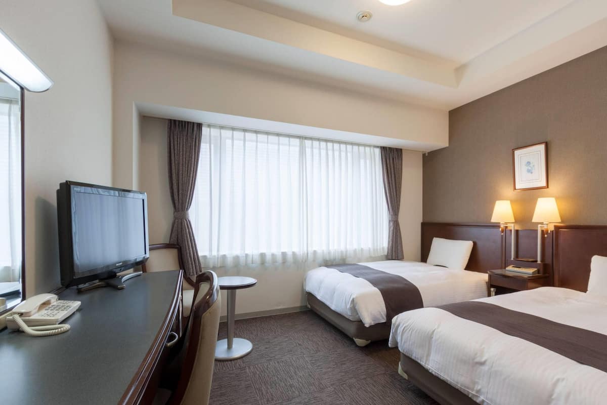 Room, 2 Single Beds, Non Smoking | Desk, laptop workspace, blackout curtains, soundproofing