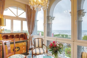Senior Suite, Sea View | Living area | TV