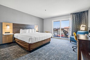 Deluxe Room, 1 King Bed, Balcony, Partial Ocean View | Pillowtop beds, desk, laptop workspace, blackout drapes