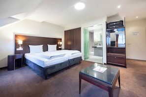 Literie hypoallergénique, minibar, coffres-forts dans les chambres