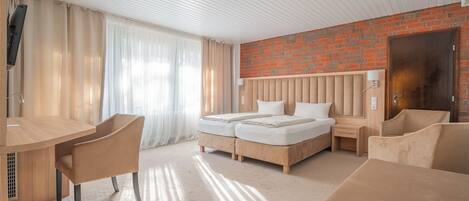 Hypo-allergenic bedding, in-room safe, desk, laptop workspace