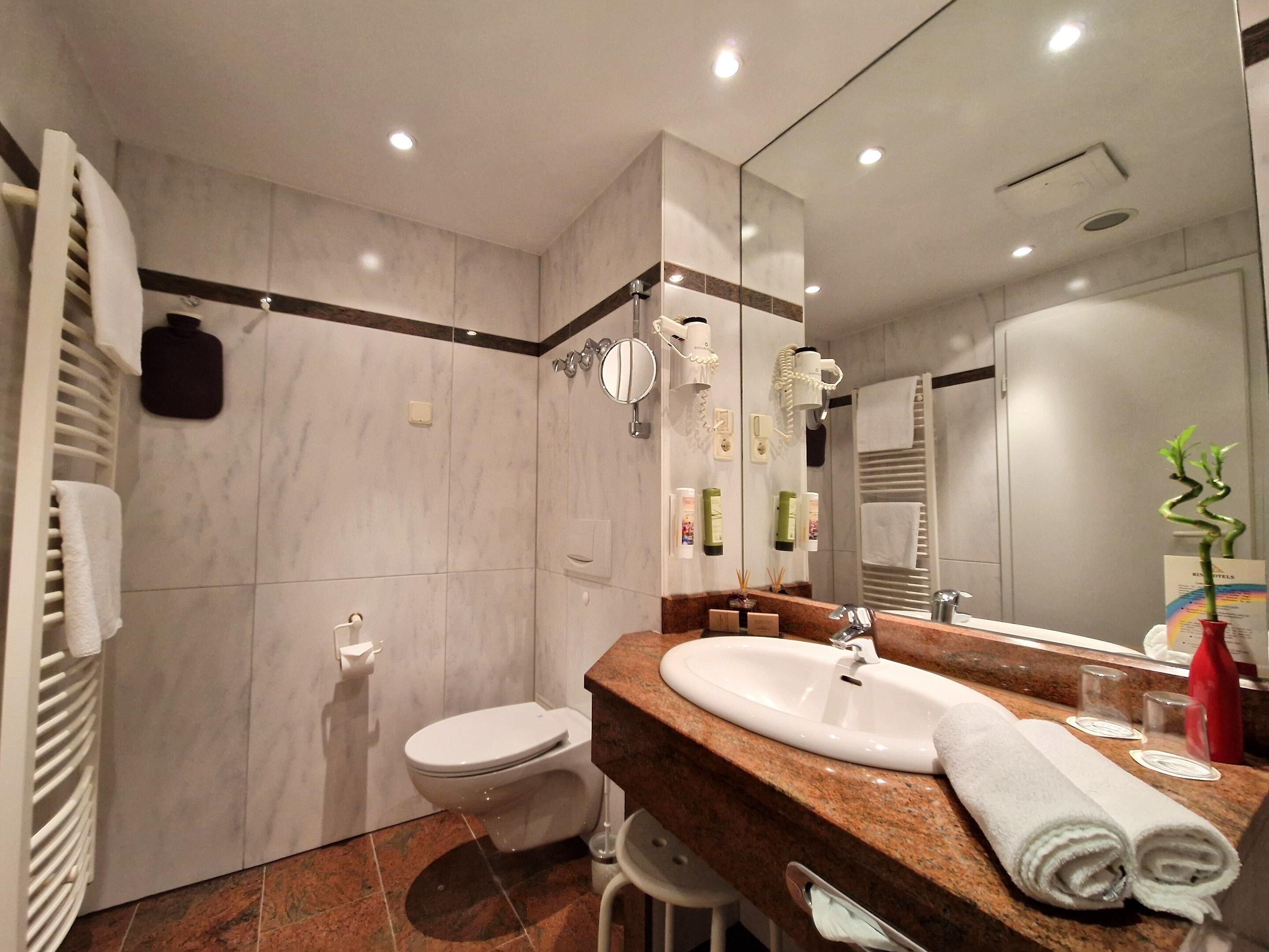 superior plus zimmer | bathroom | hair dryer, bathrobes, slippers, towels