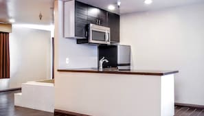 Romantic Loft, 1 King Bed, Jetted Tub | Pillow-top beds, desk, iron/ironing board, free WiFi