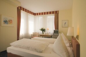 Premium bedding, down duvets, pillow-top beds, minibar