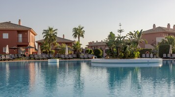 2 outdoor pools, pool umbrellas, sun loungers