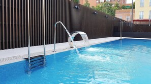 Seasonal outdoor pool, pool umbrellas, sun loungers
