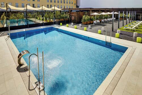 Seasonal outdoor pool, pool umbrellas, pool loungers
