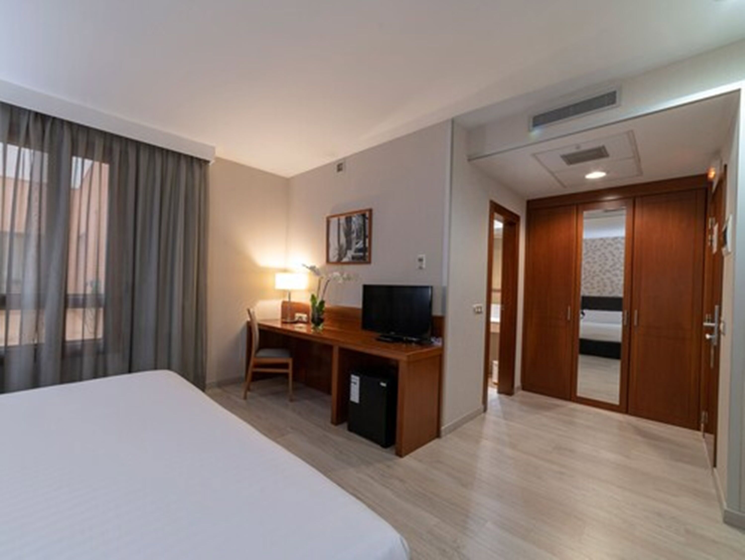 double or twin room | minibar, in-room safe, desk, iron/ironing board