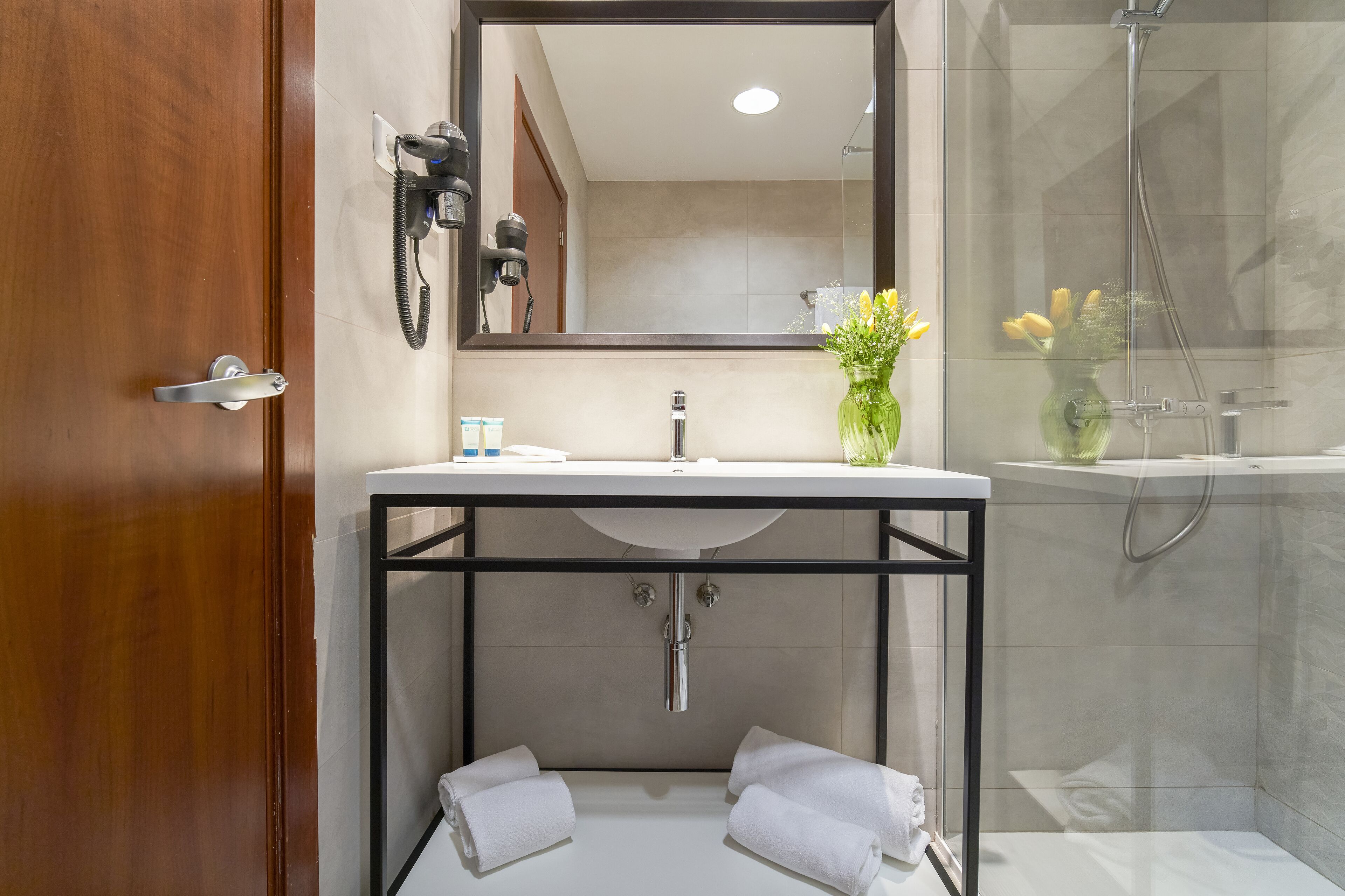 bathtub, free toiletries, hair dryer, towels