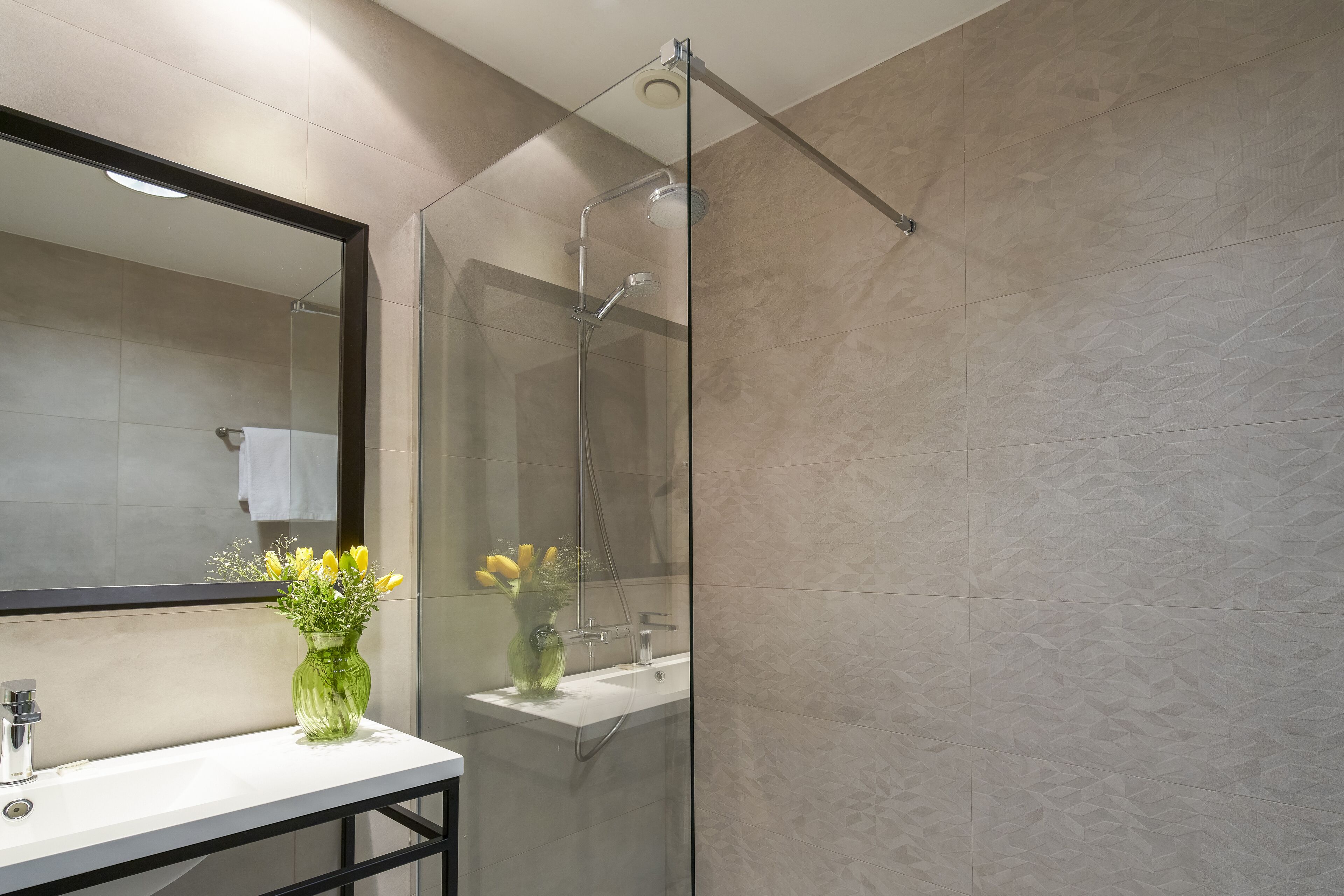 bathtub, free toiletries, hair dryer, towels