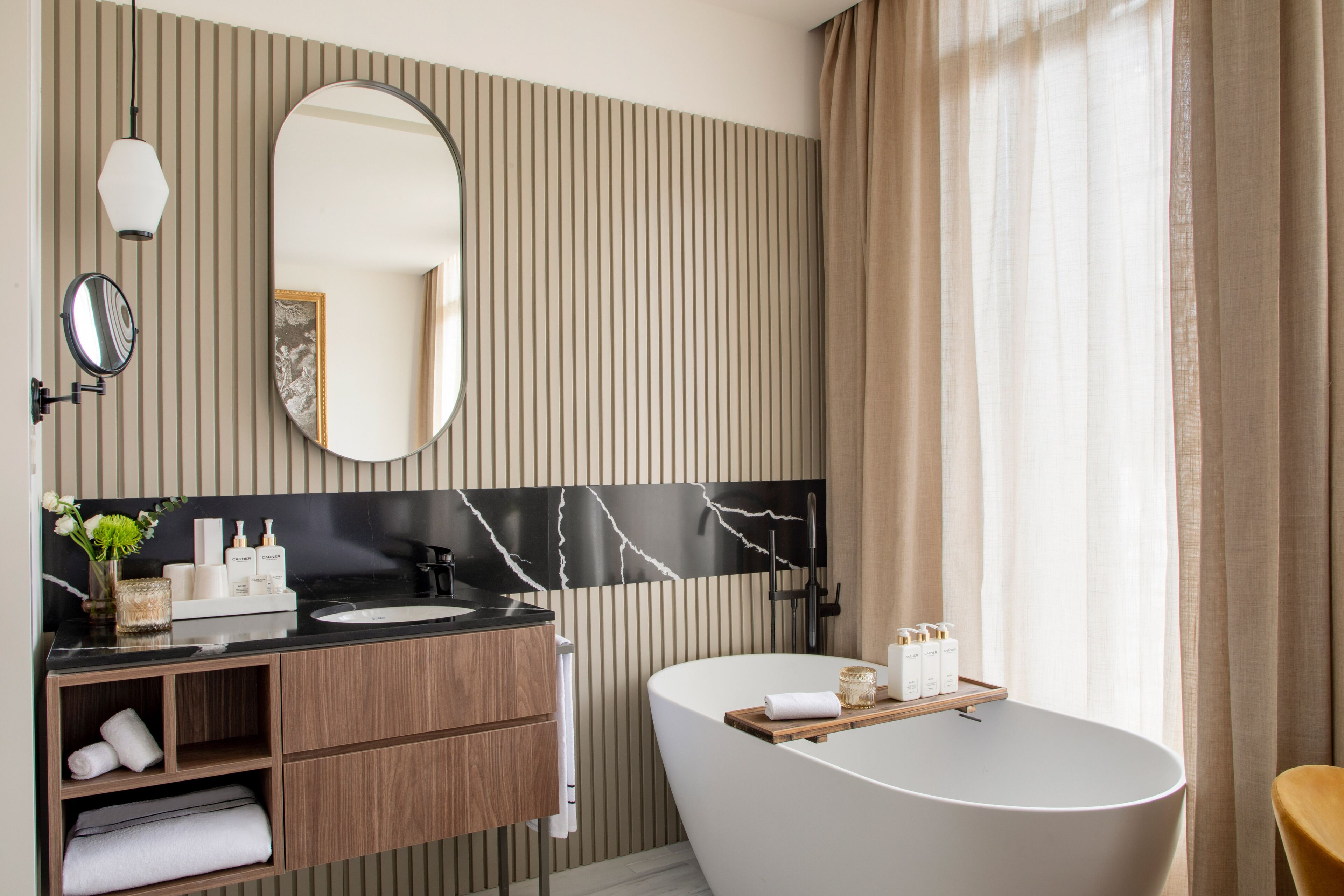 deluxe extra room city view | bathroom | hair dryer, bathrobes, slippers, towels