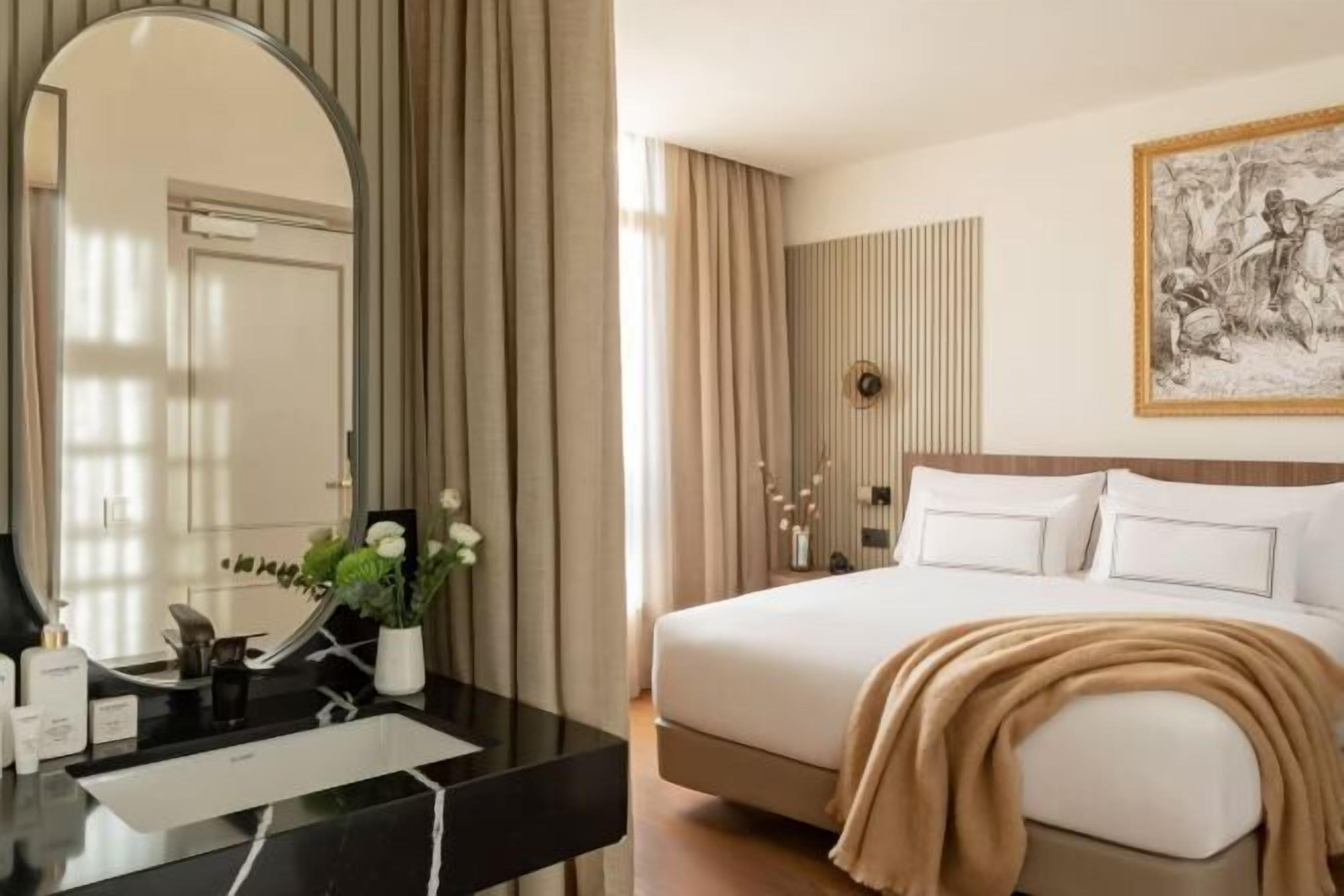Premium bedding, down comforters, pillowtop beds, minibar
