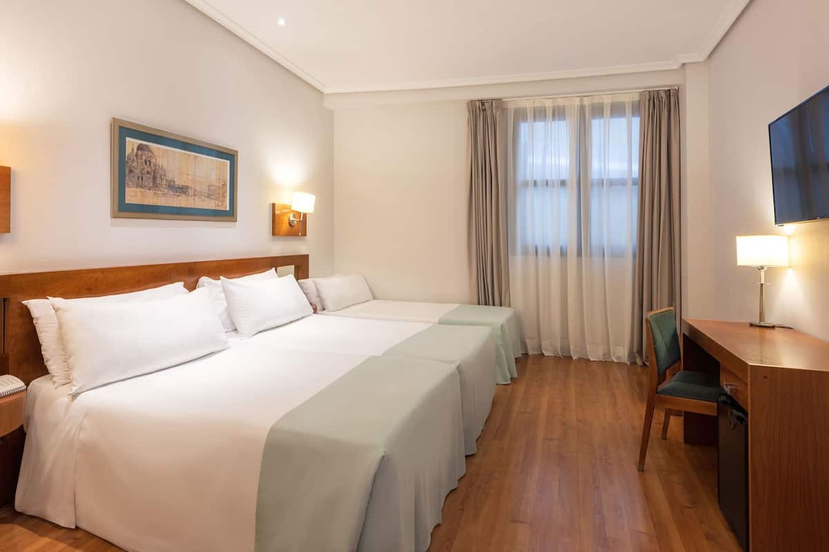 Premium bedding, down comforters, pillowtop beds, minibar