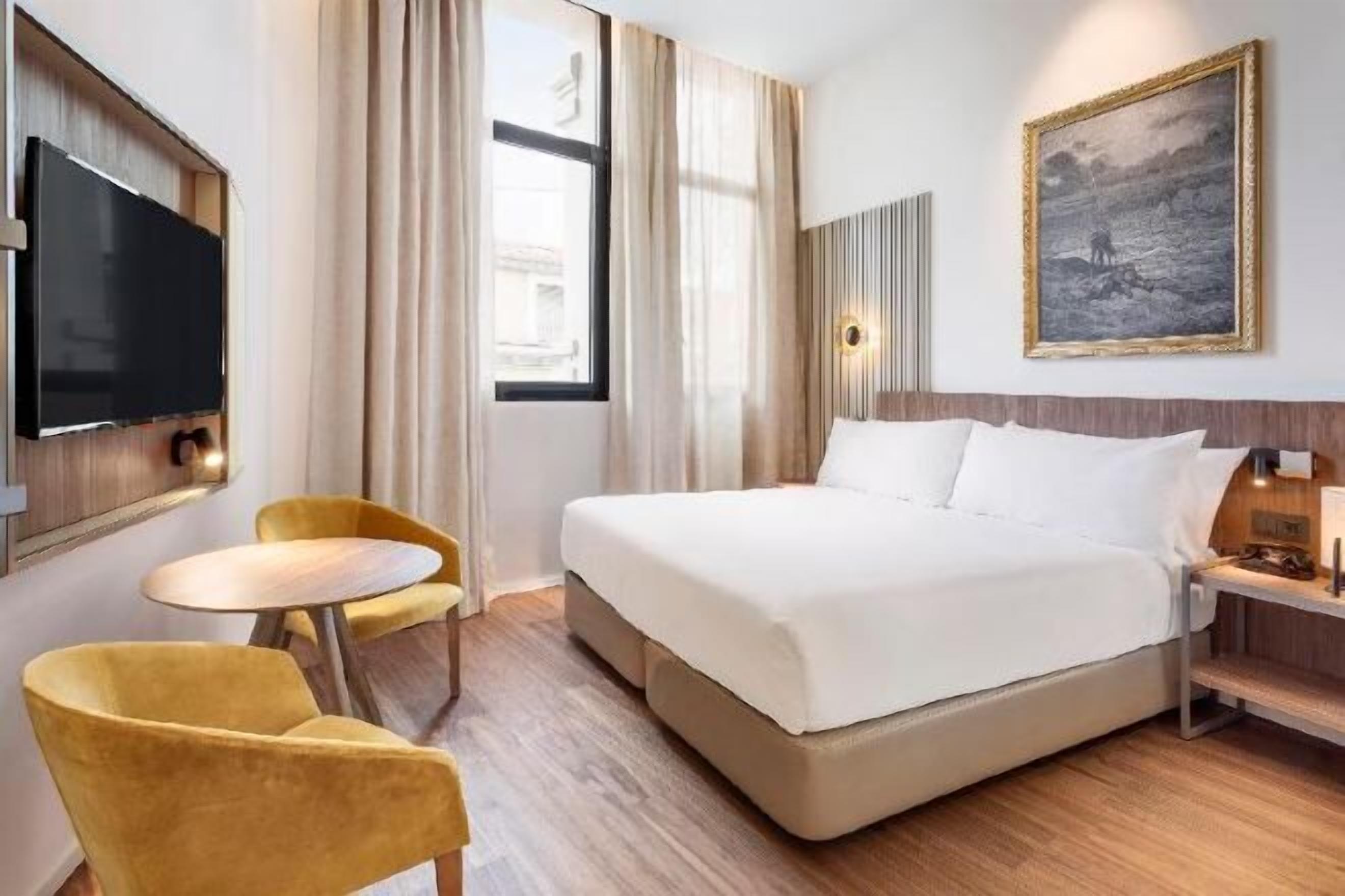 Premium bedding, down comforters, pillowtop beds, minibar