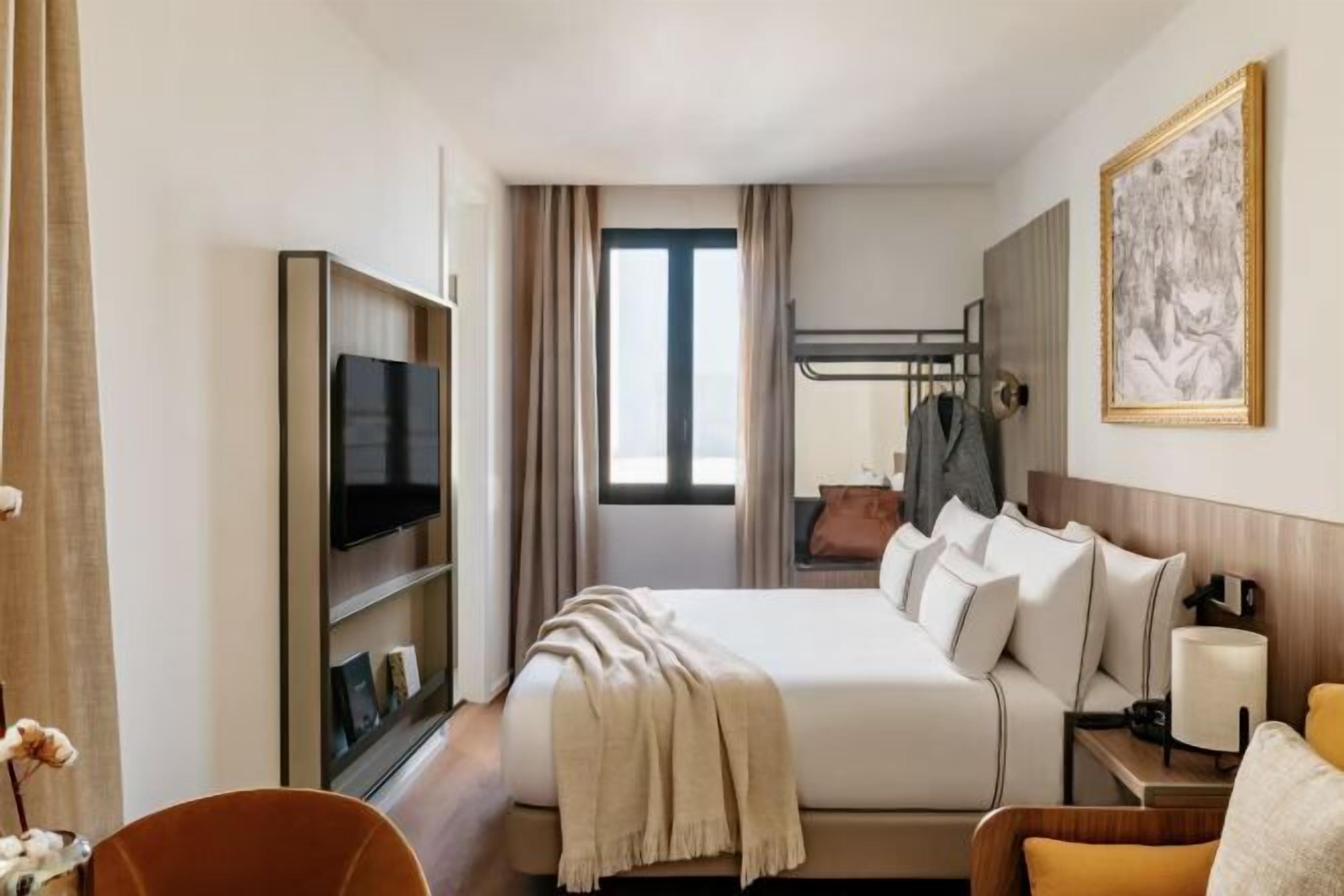 Premium bedding, down comforters, pillowtop beds, minibar
