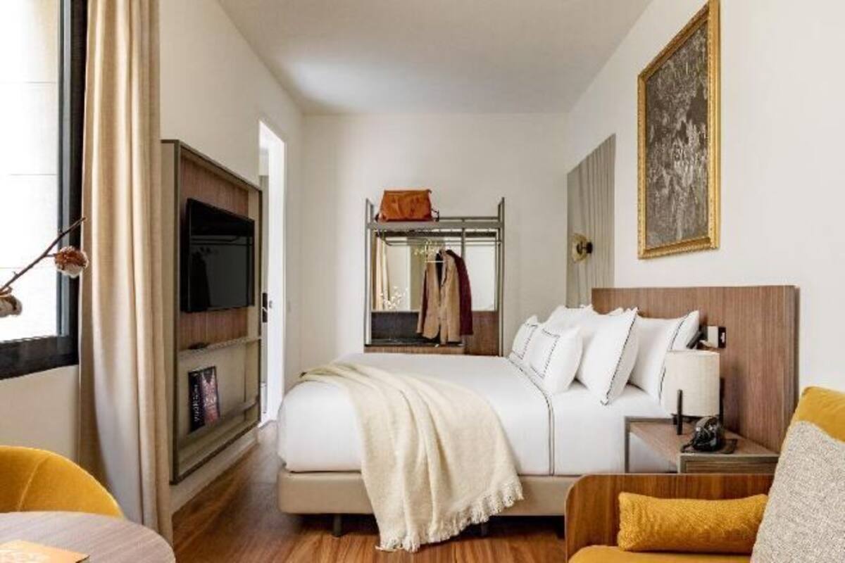 Premium bedding, down comforters, pillowtop beds, minibar