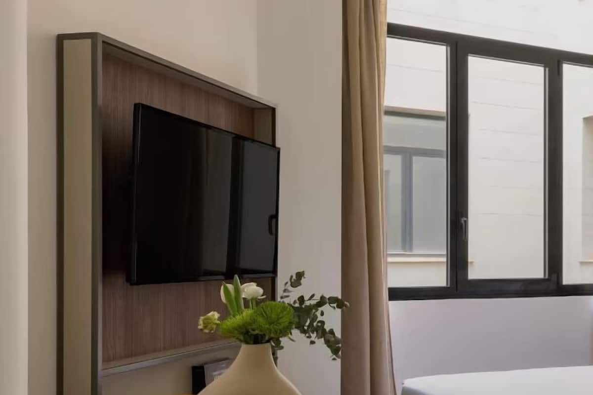 Hochwertige Bettwaren, Daunenbettdecken, Pillowtop-Betten, Minibar