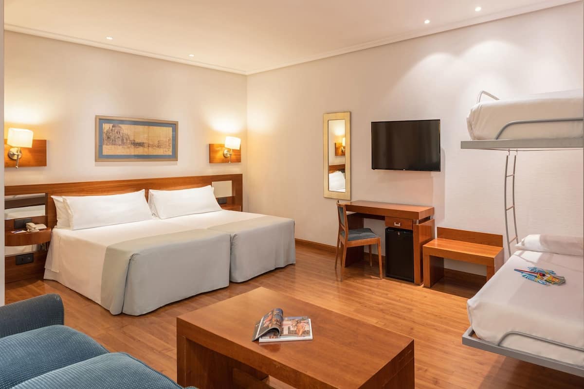 Premium bedding, down comforters, pillowtop beds, minibar