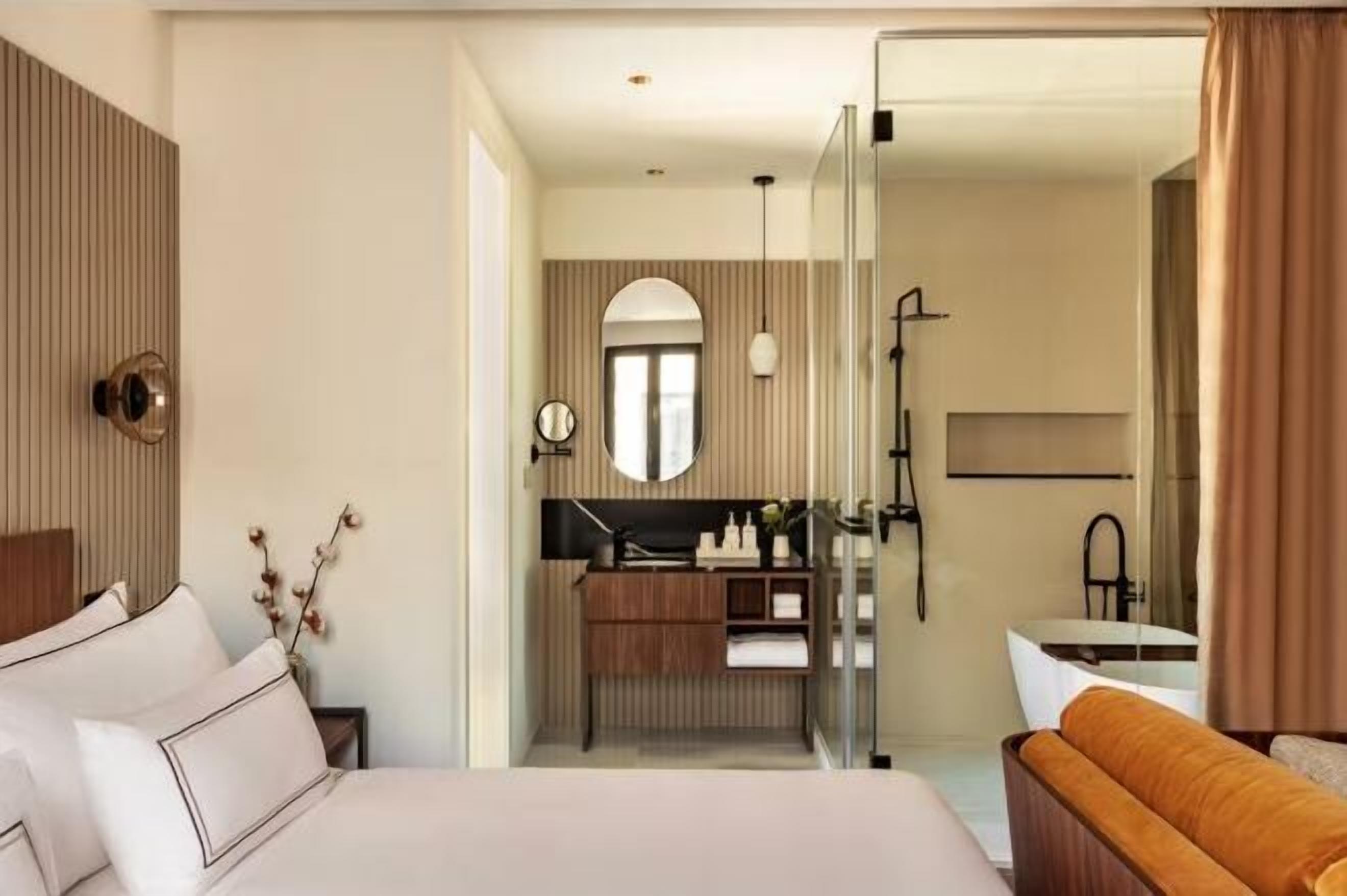 Premium bedding, down comforters, pillowtop beds, minibar
