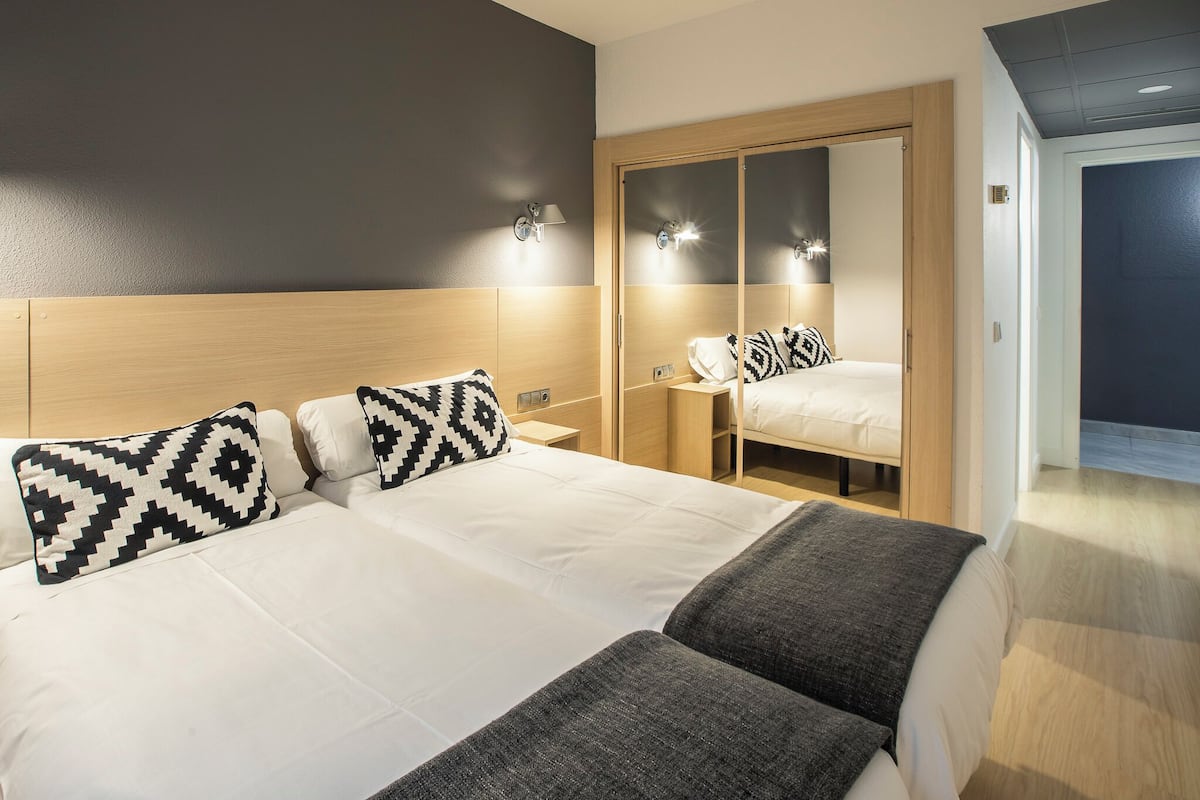 Premium bedding, in-room safe, desk, iron/ironing board (on request)