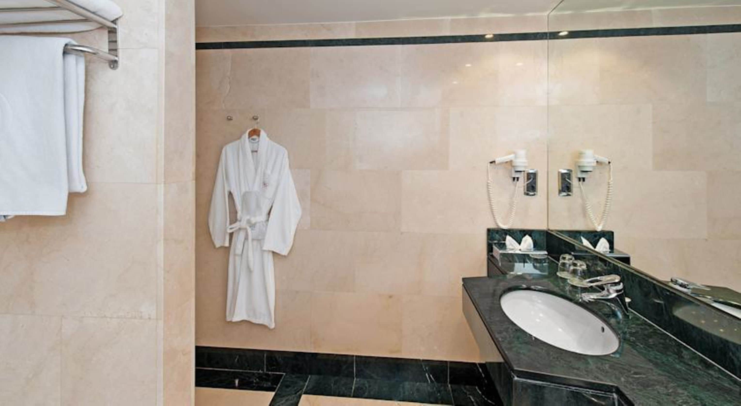 hair dryer, bidet, towels