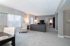 Suite, 1 King Bed (Extra Living Area) | Hypo-allergenic bedding, desk, blackout drapes, iron/ironing board