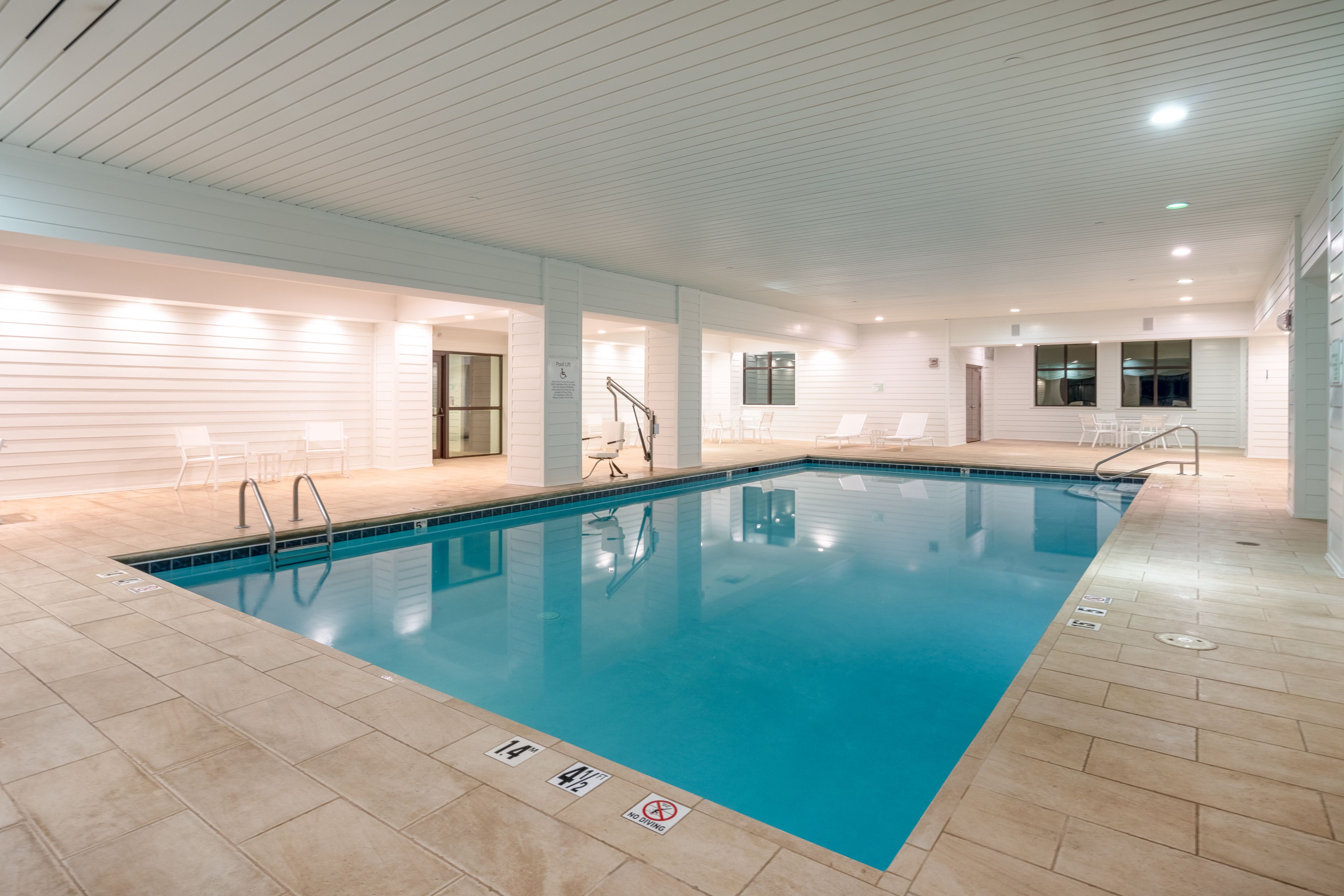 indoor pool, pool loungers