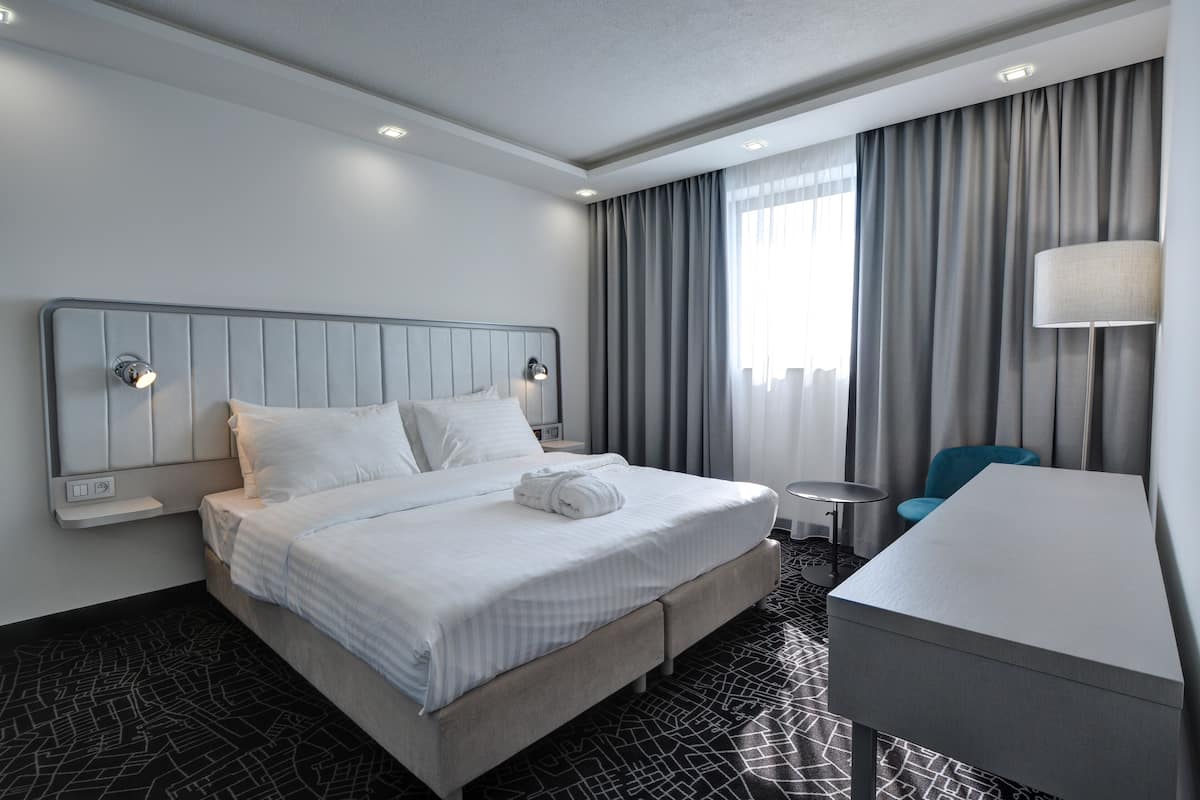 Suite Junior | Literie hypoallergénique, minibar, coffre-fort pour ordinateur portable