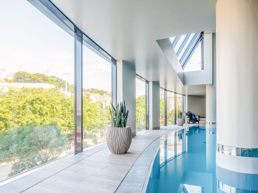 Indoor pool, open 8:00 AM to 8:00 PM, pool loungers
