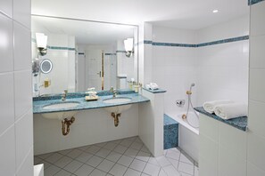 Shower, eco-friendly toiletries, hair dryer, bathrobes