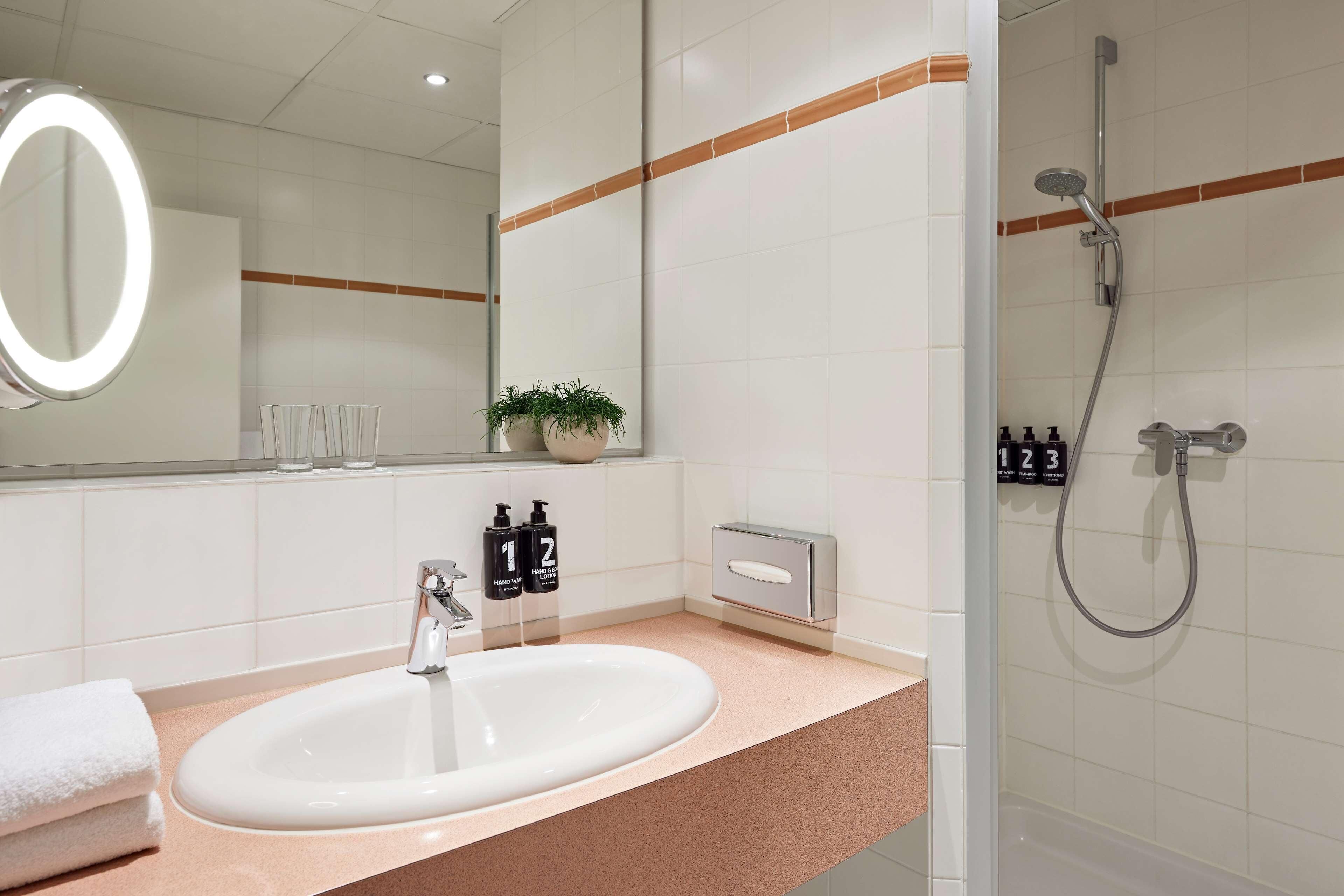 classic double room | bathroom | eco-friendly toiletries, hair dryer, bathrobes, towels
