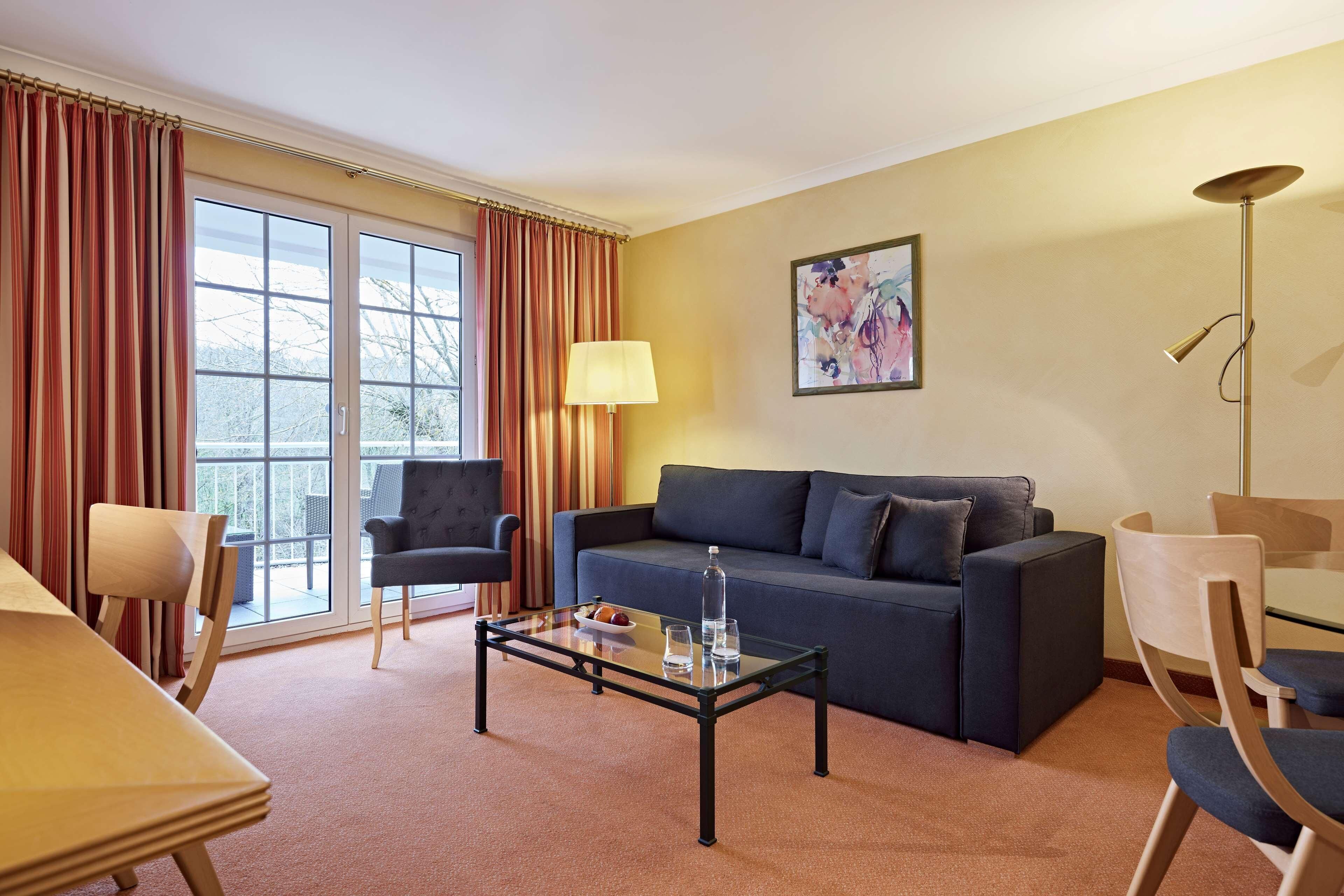 deluxe double room | living area | 43-inch led tv with cable channels, tv