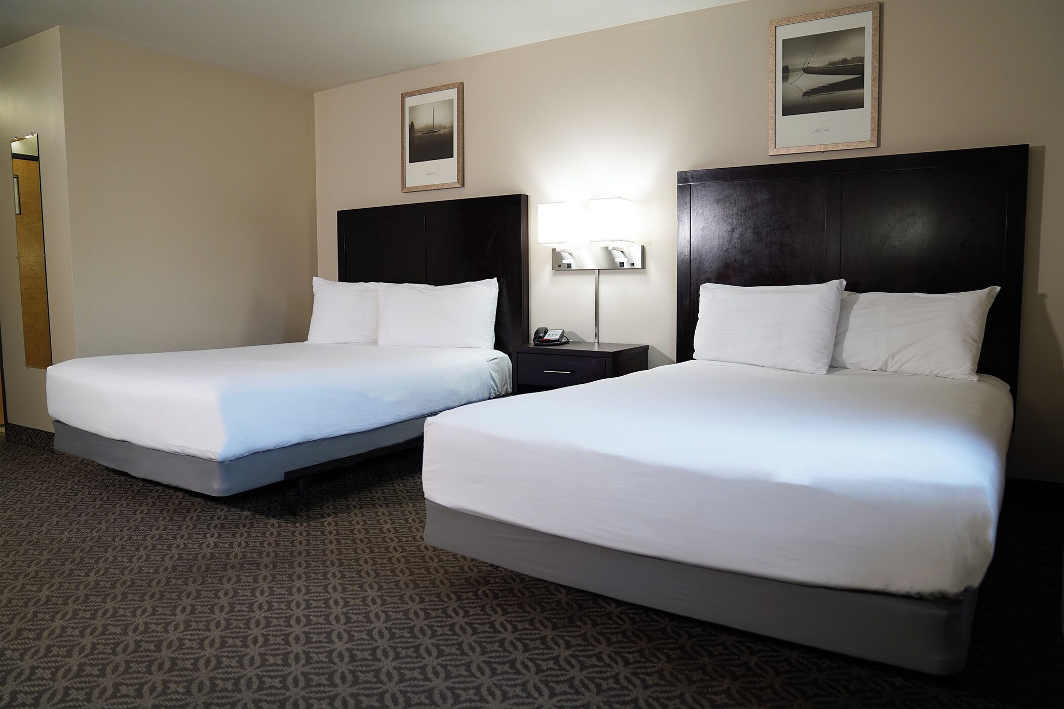 double queen | premium bedding, pillow-top beds, individually furnished, desk