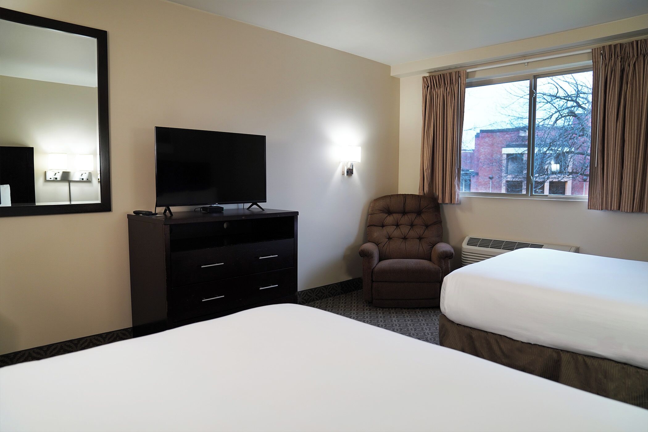 deluxe double | premium bedding, pillow-top beds, individually furnished, desk