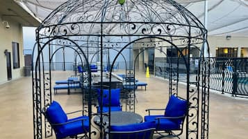 Outdoor pool, open 6:00 AM to 7:00 PM, pool loungers