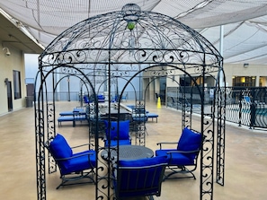 Outdoor pool, open 6:00 AM to 7:00 PM, pool loungers