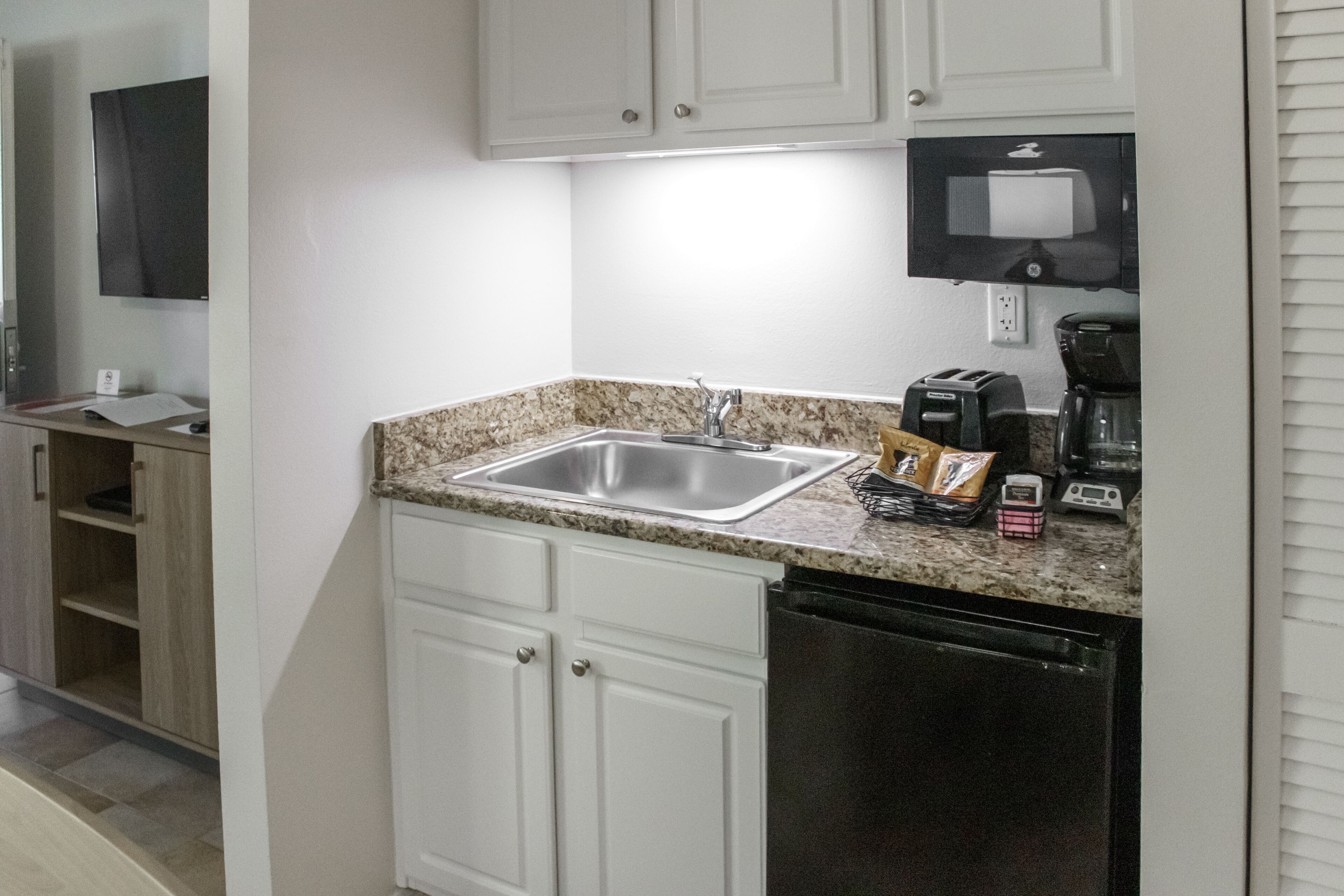 condo, 1 bedroom, kitchenette | private kitchenette | microwave, coffee/tea maker, cookware/dishes/utensils