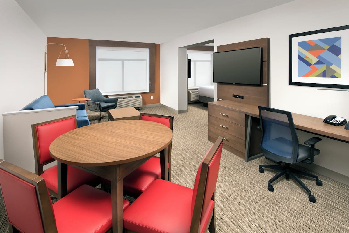 Suite, 1 King Bed, Accessible (Comm) | In-room safe, desk, laptop workspace, blackout drapes