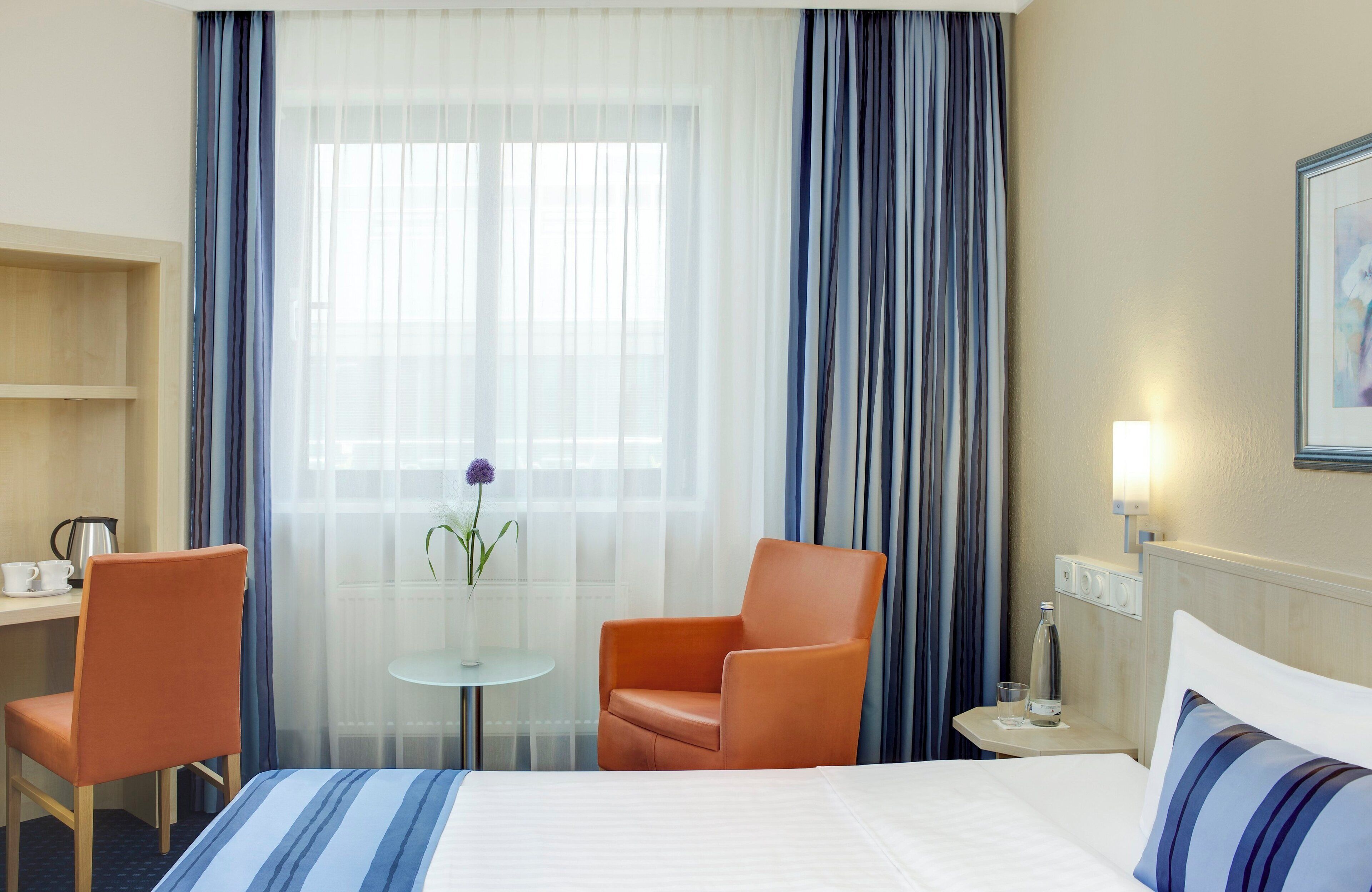 Hypo-allergenic bedding, in-room safe, desk, laptop workspace