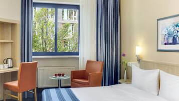 Hypo-allergenic bedding, in-room safe, desk, laptop workspace