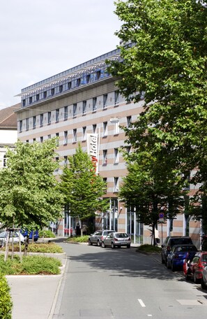 Experience the comfort of our hotel, surrounded by lush greenery and offering balconies for every room.